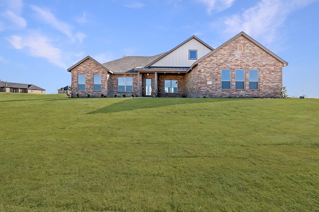 craftsman inspired home with a front yard