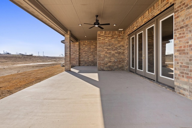 view of patio / terrace featuring ceiling fan