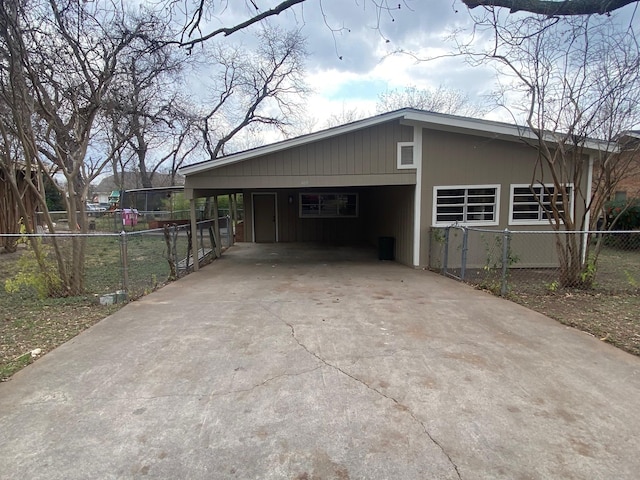 view of property exterior with a carport