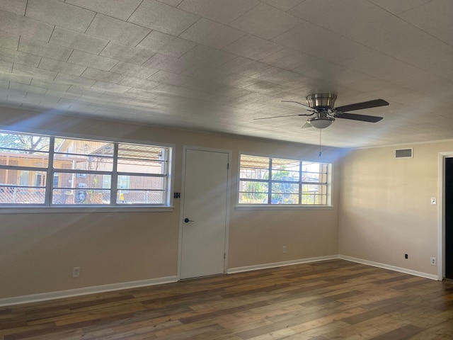 entryway with ceiling fan and dark hardwood / wood-style floors