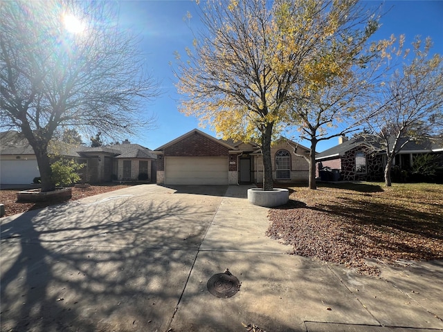 single story home with a garage