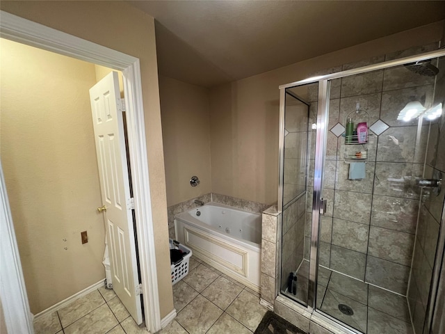 bathroom with tile patterned flooring and independent shower and bath