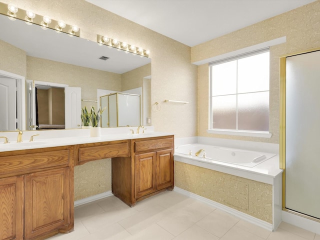 bathroom featuring tile patterned floors, vanity, and separate shower and tub