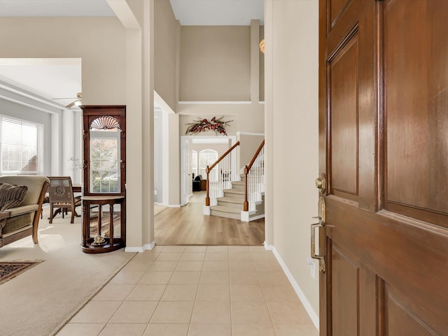 view of carpeted foyer