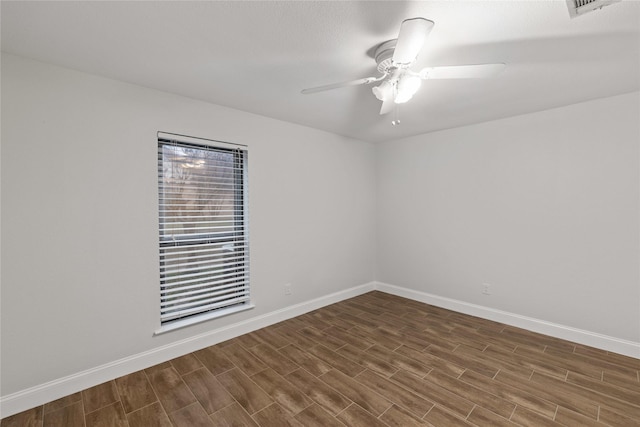 empty room featuring ceiling fan