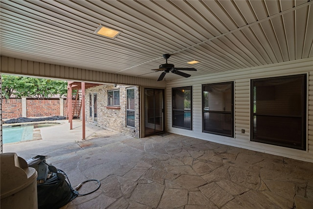 view of patio with ceiling fan