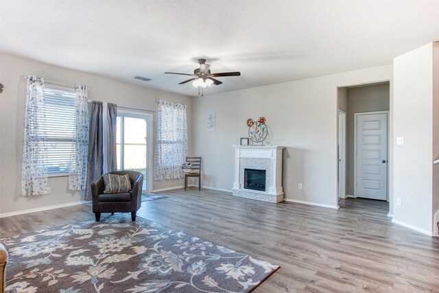 unfurnished room with ceiling fan and wood-type flooring