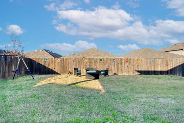 view of yard with a playground