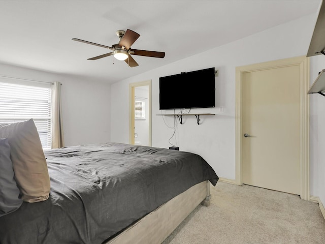 bedroom with light colored carpet and ceiling fan