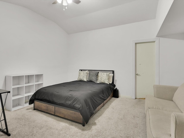 carpeted bedroom with ceiling fan and lofted ceiling