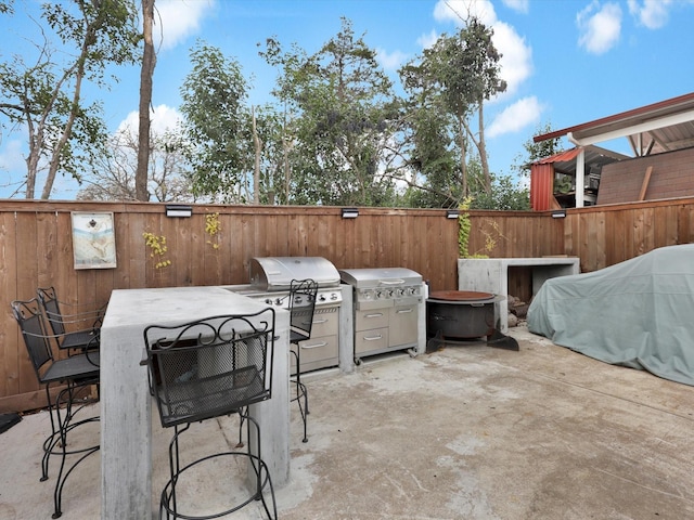 view of patio / terrace with an outdoor bar