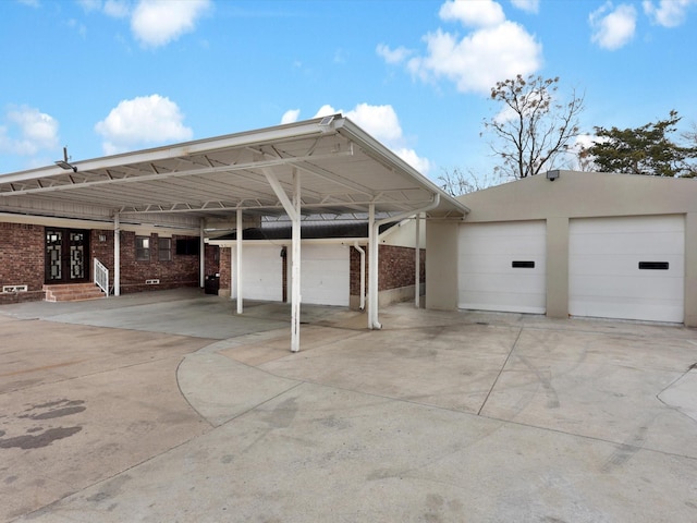 view of vehicle parking with a carport