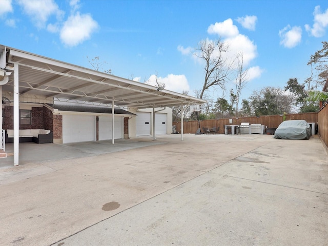 view of car parking with a carport