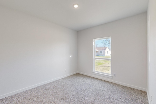 view of carpeted spare room