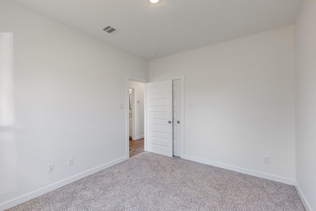 view of carpeted spare room