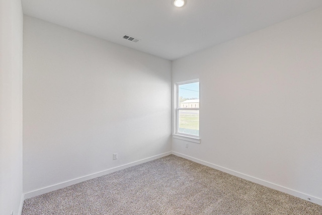 empty room featuring carpet floors