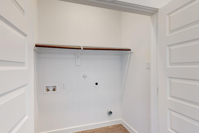 clothes washing area with hookup for an electric dryer, hookup for a gas dryer, hookup for a washing machine, and light hardwood / wood-style flooring