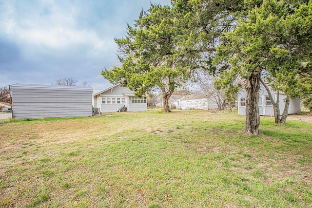 view of yard with a carport