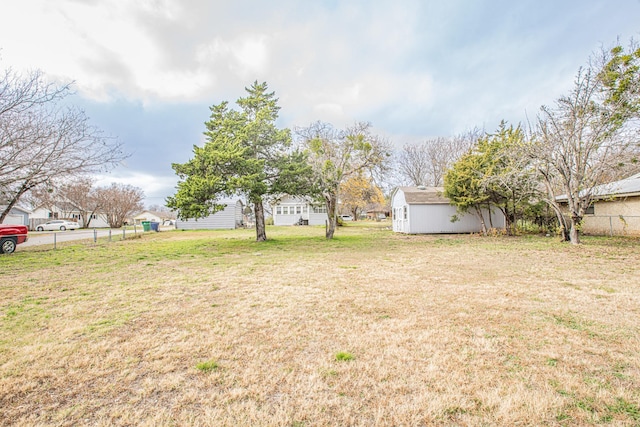 view of yard with a storage shed