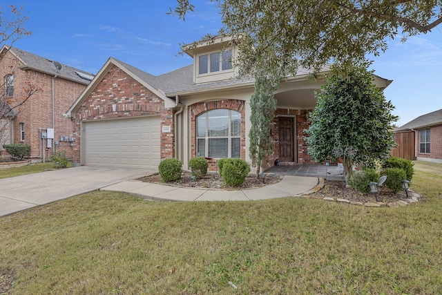 view of front of house with a garage and a front yard