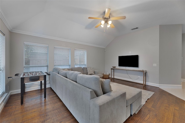 living room featuring ceiling fan, dark hardwood / wood-style floors, lofted ceiling, and ornamental molding