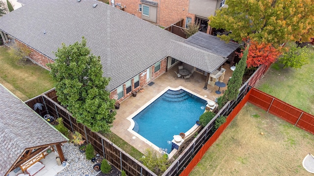 view of swimming pool featuring a patio