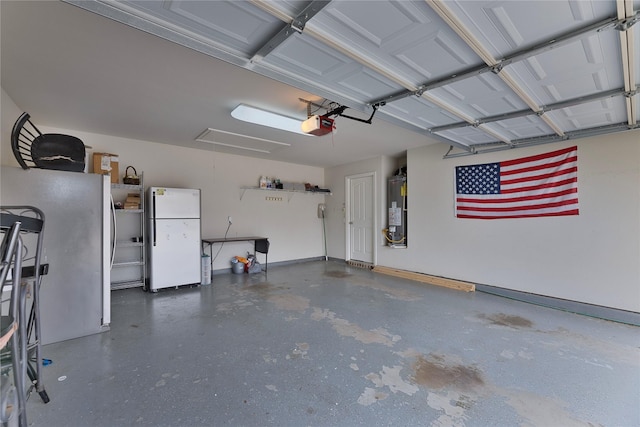 garage with refrigerator, white fridge, gas water heater, and a garage door opener