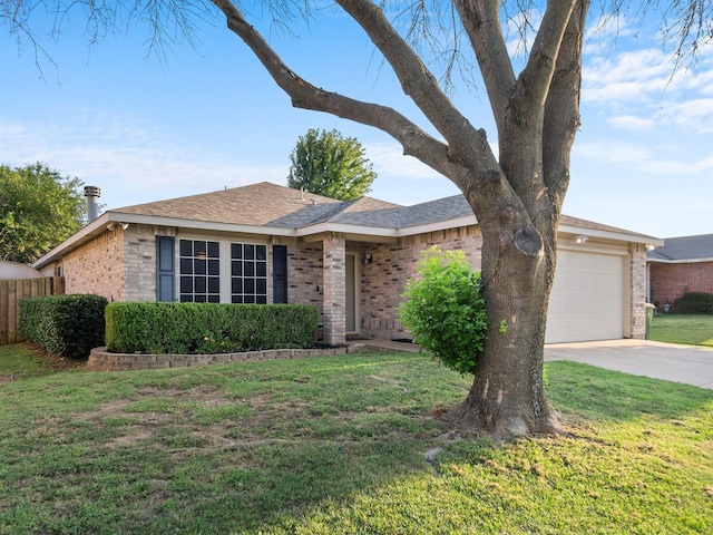 ranch-style house with a front yard and a garage