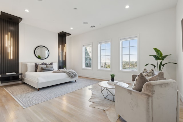 bedroom with light hardwood / wood-style floors