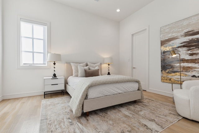 bedroom featuring light hardwood / wood-style flooring