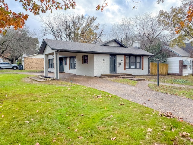 view of front of home with a front lawn