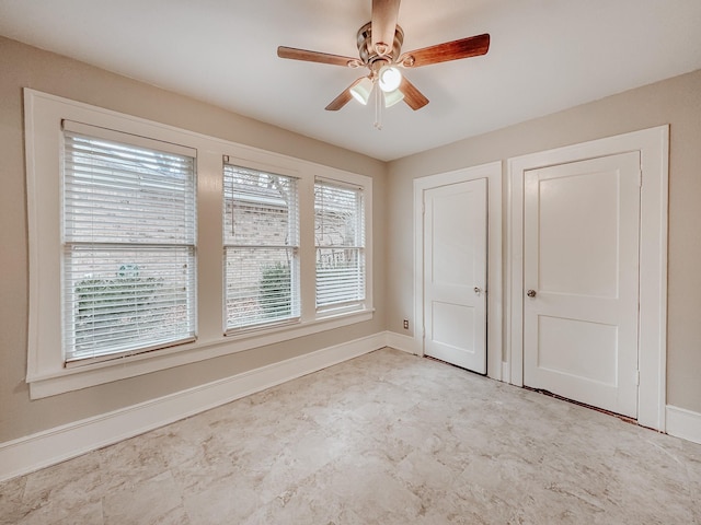 unfurnished bedroom with ceiling fan