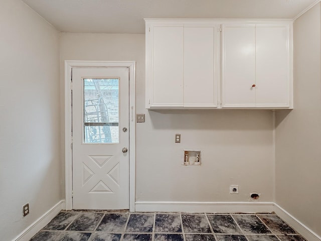 washroom with hookup for an electric dryer, cabinets, and hookup for a washing machine