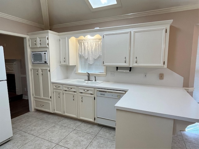 kitchen featuring kitchen peninsula, white cabinetry, sink, and white appliances