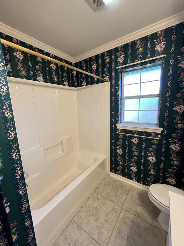 bathroom featuring toilet, visible vents, baseboards, tile patterned floors, and wallpapered walls