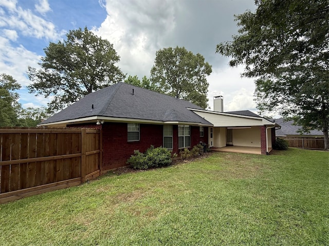 6420 Sand Hill Ave, Shreveport, LA 71107 - rear view of property with a chimney, brick siding, a patio area, and roof with shingles