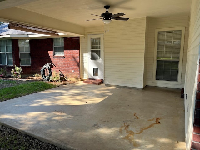 view of patio with ceiling fan