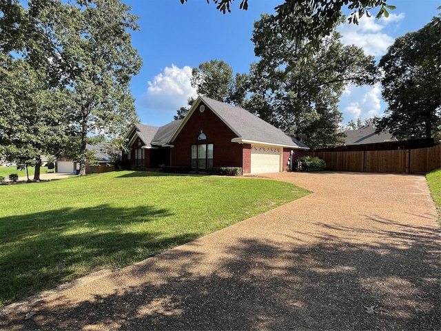 view of side of home with a garage and a yard