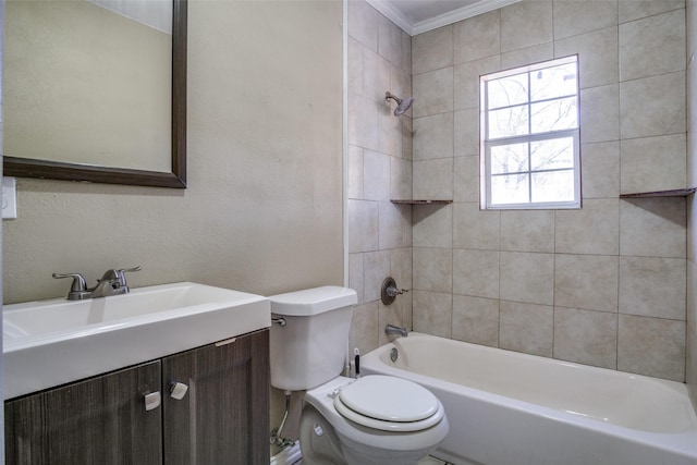 full bathroom featuring vanity, ornamental molding, tiled shower / bath combo, and toilet