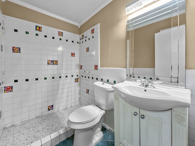 bathroom with vanity, crown molding, tile walls, tile patterned flooring, and toilet