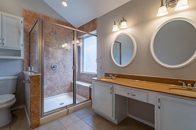 bathroom featuring walk in shower, tile patterned flooring, lofted ceiling, toilet, and vanity