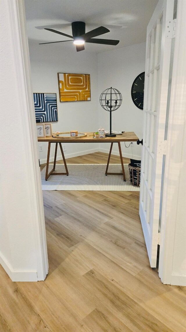 carpeted bedroom featuring a spacious closet, a closet, lofted ceiling, and ceiling fan