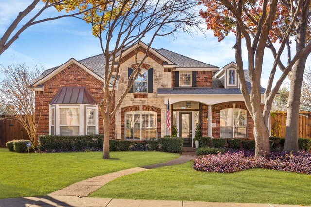 view of front of house with a front lawn