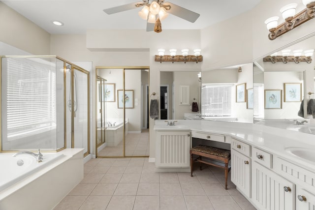 bathroom featuring vanity, separate shower and tub, tile patterned floors, and ceiling fan