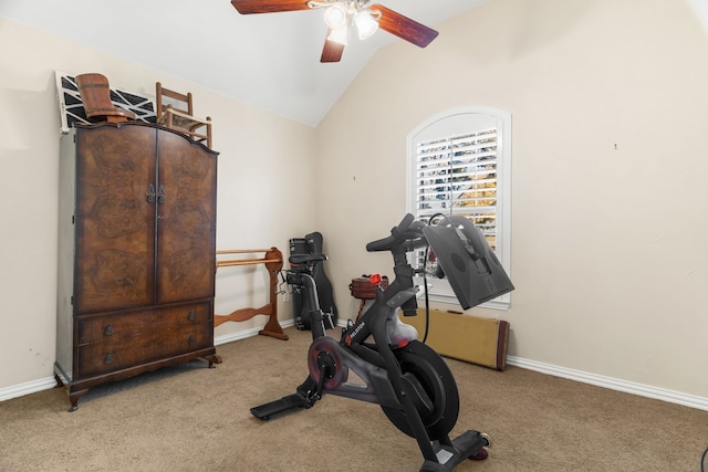 workout area with ceiling fan, light colored carpet, and lofted ceiling