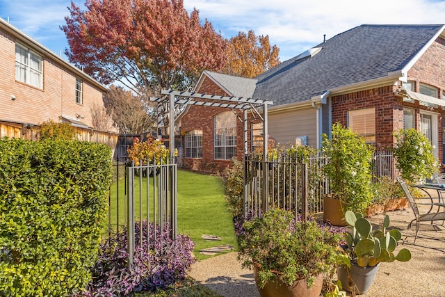 exterior space featuring a pergola