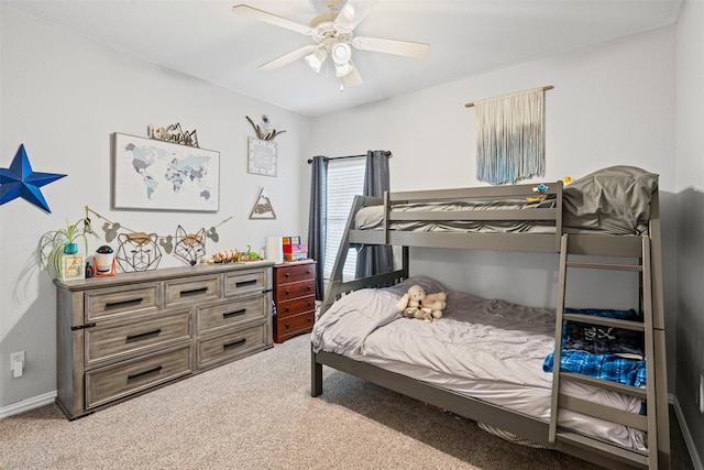 bedroom with ceiling fan and carpet