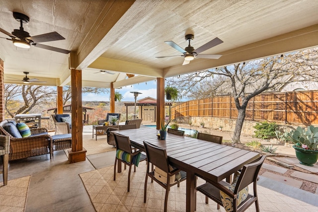 view of patio / terrace featuring ceiling fan and an outdoor hangout area