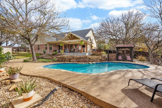 view of pool with a gazebo and a patio area