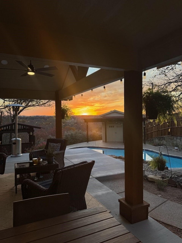 exterior space featuring a gazebo, a patio area, and ceiling fan